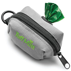 Porte-sacs de déjections Tuff Mutt avec attache velcro sur laisse, pratique et sûr.