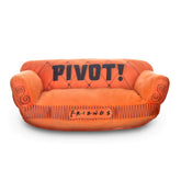 Jouet chien Warner Bros Amis canapé pivot orange pour câlins.