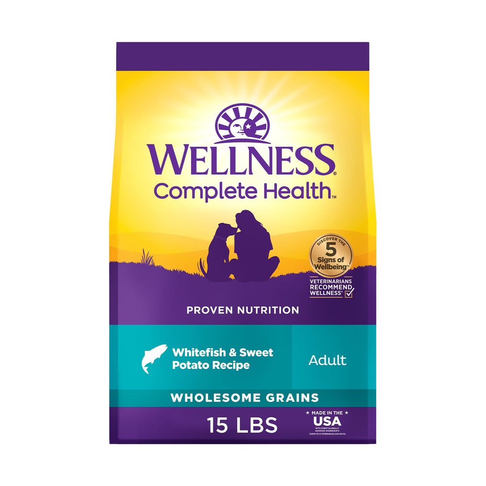Wellness Complete Health: poisson blanc et patate douce, croquettes équilibrées pour chien adulte.