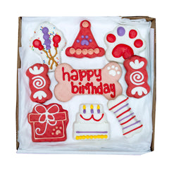 Coffret WÜFERS anniversaire pour chien avec biscuits décorés rouge.