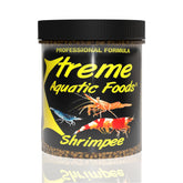 Xtreme Shrimpee batonnets 3mm en action nourrissant les crevettes