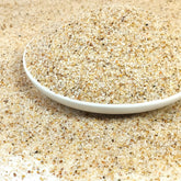 Sable d'aquarium beige YISZM 5 lb pour un décor naturel et apaisant.