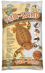Zoo Med Vita-Sand Sonoran White – substrat calcique enrichi, favorise la nutrition des reptiles.