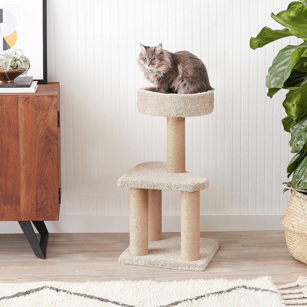 Plateau supérieur arrondi avec rebord, parfait comme lit d’appoint.