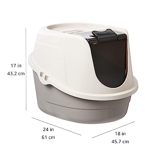 Poignée intégrée pour transporter facilement la boîte à litière Amazon Basics.