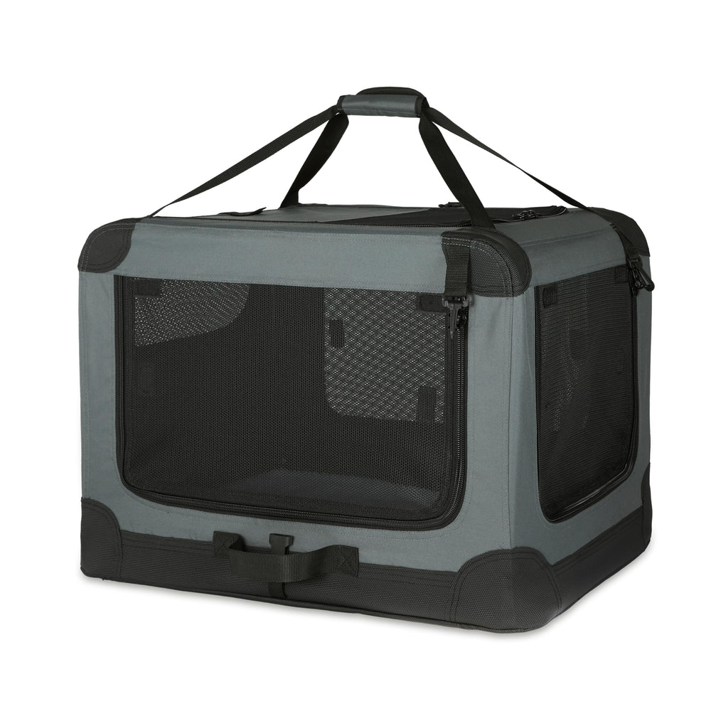Chenil Amazon Basics portatif à quatre portes, pratique pour le transport et le couchage.