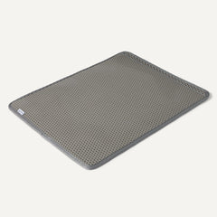 Amazon Basics tapis litière chat fond antidérapant assure stabilité.