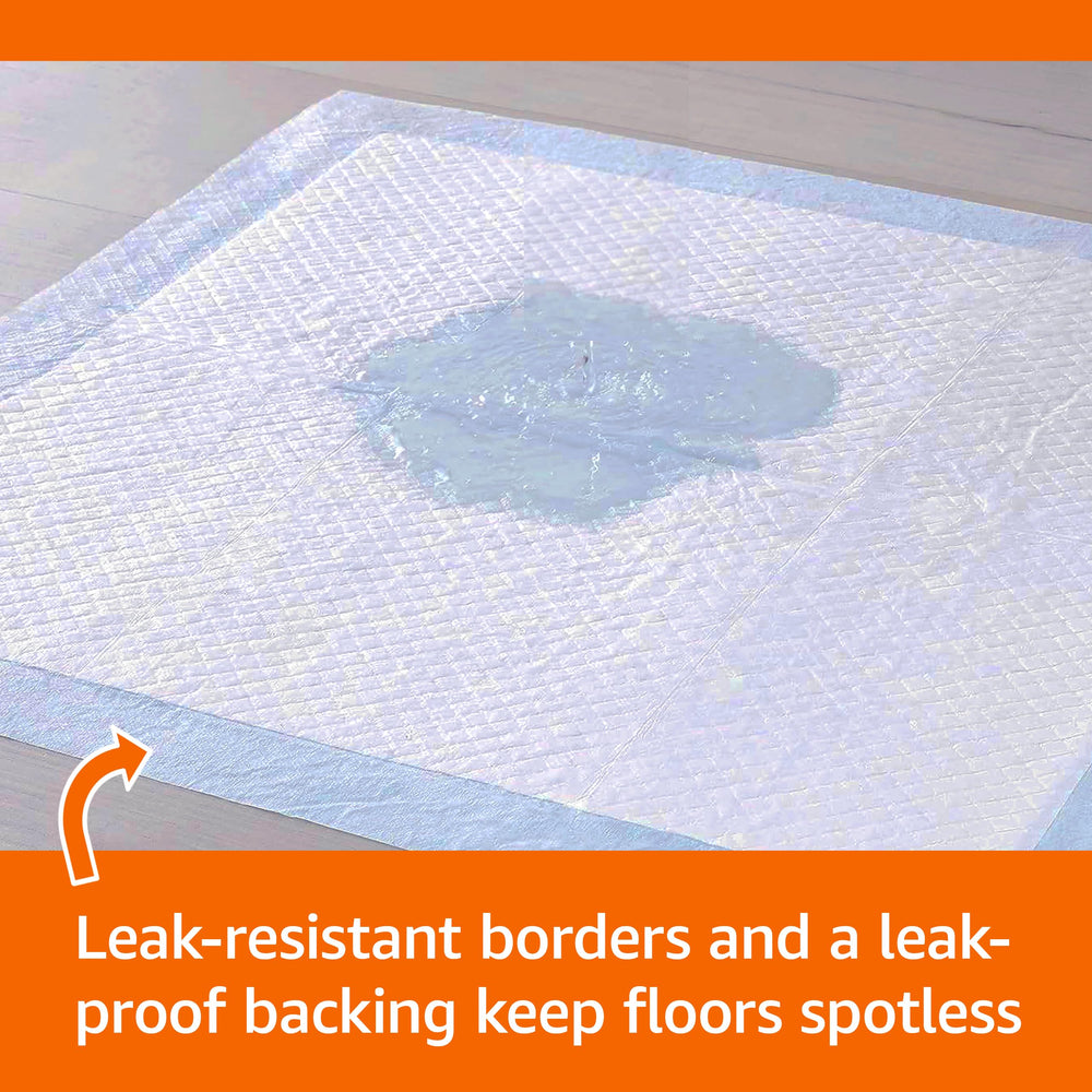 Tapis-pipi Amazon Basics avec bordures anti-fuites, protégeant les sols.