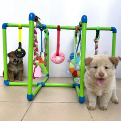Amlmpet Puppy Play Gym avec neuf jouets pendus pour stimulation mentale.