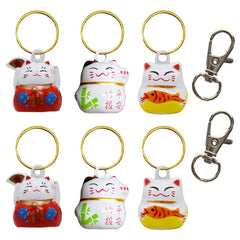 Clochette Barleygoo chat chanceux rouge sur collier, facile à repérer et festive.