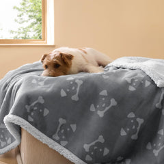 Bedsure couverture imperméable pour chien gris-ancre protège le canapé des liquides.