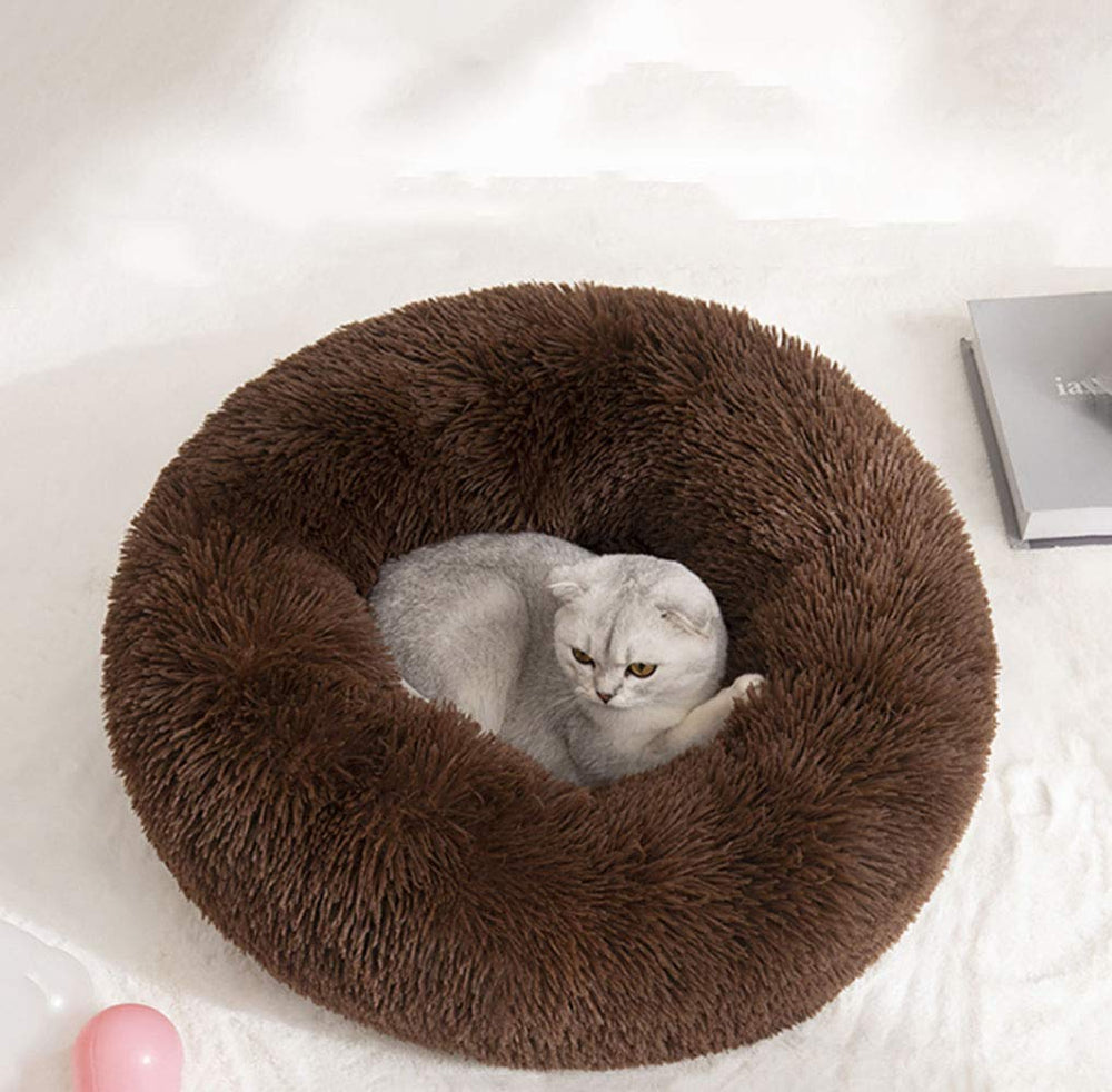 Vue haust-nid rond enveloppant idéal pour petits animaux.