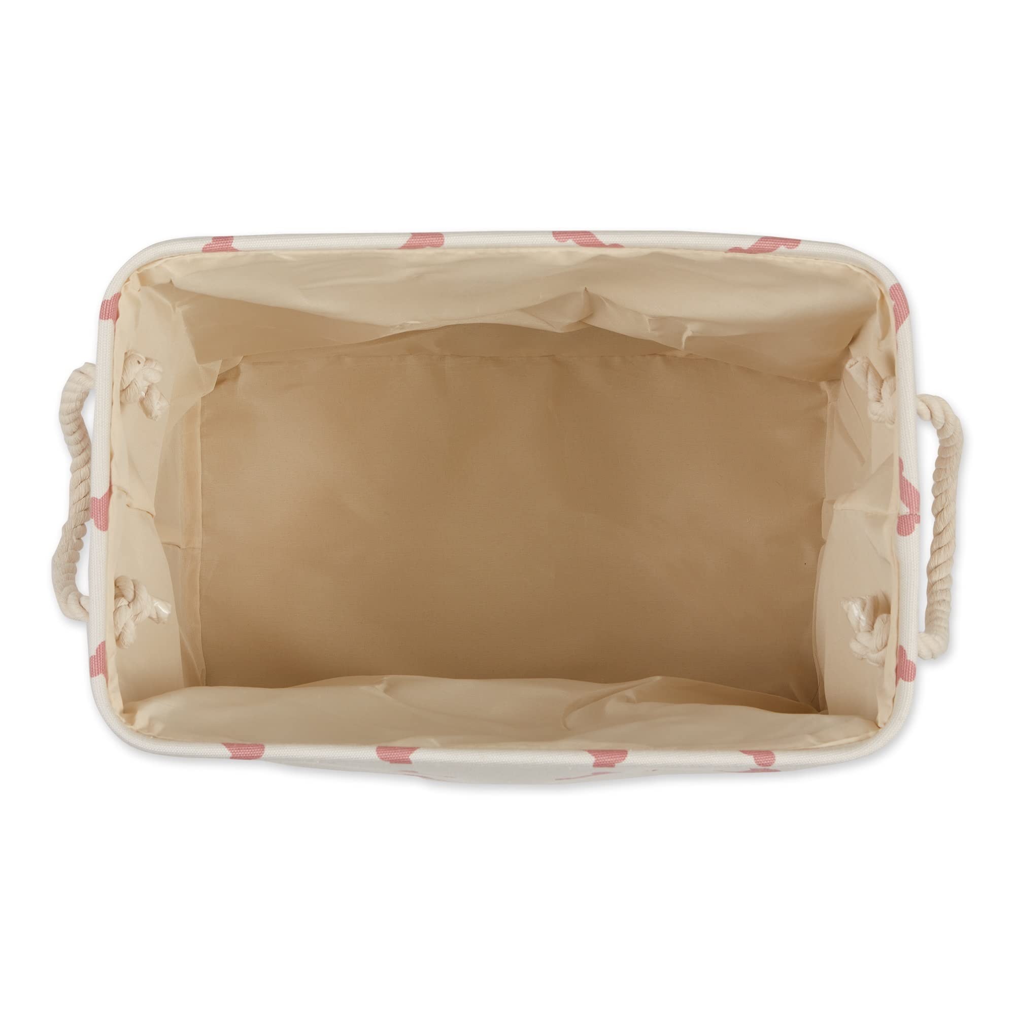 Ouverture et poignées du panier Bone Dry motif patte et os facilitent le transport.