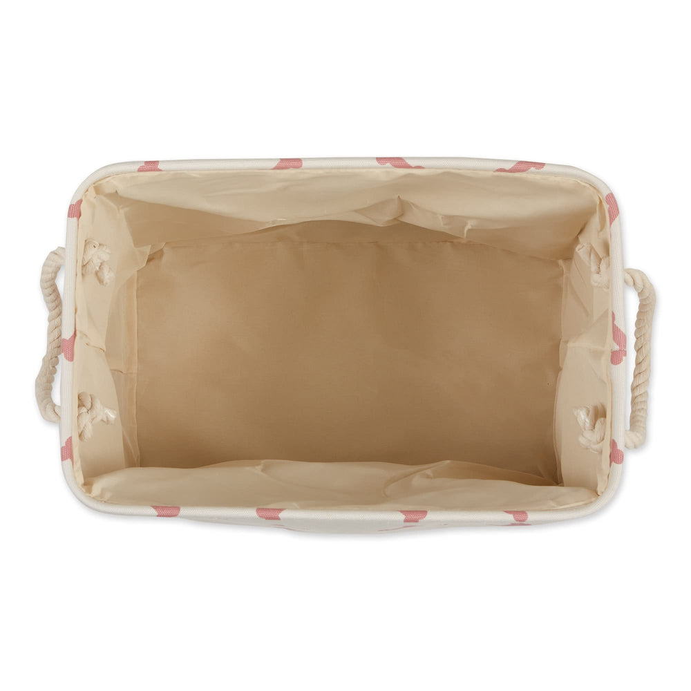 Ouverture et poignées du panier Bone Dry motif patte et os facilitent le transport.