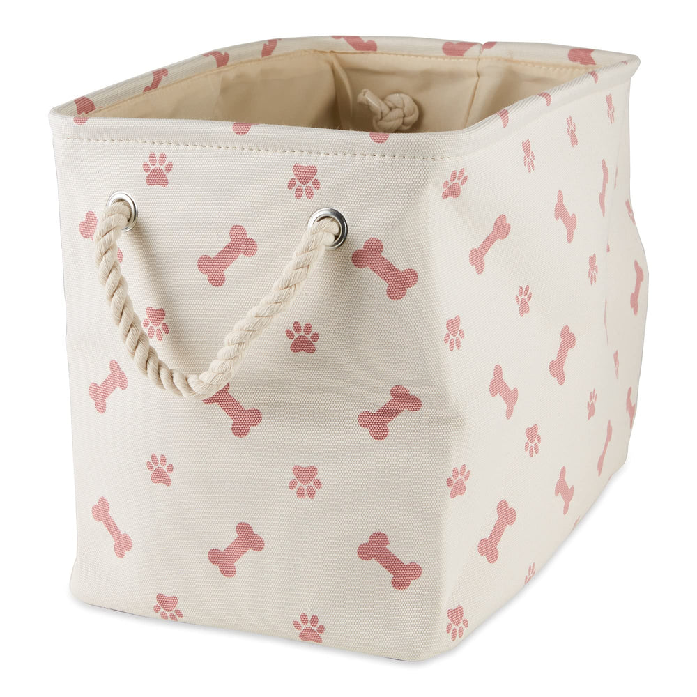 Panier Bone Dry taille petite avec motif patte et os rose, idéal pour ranger friandises et jouets.