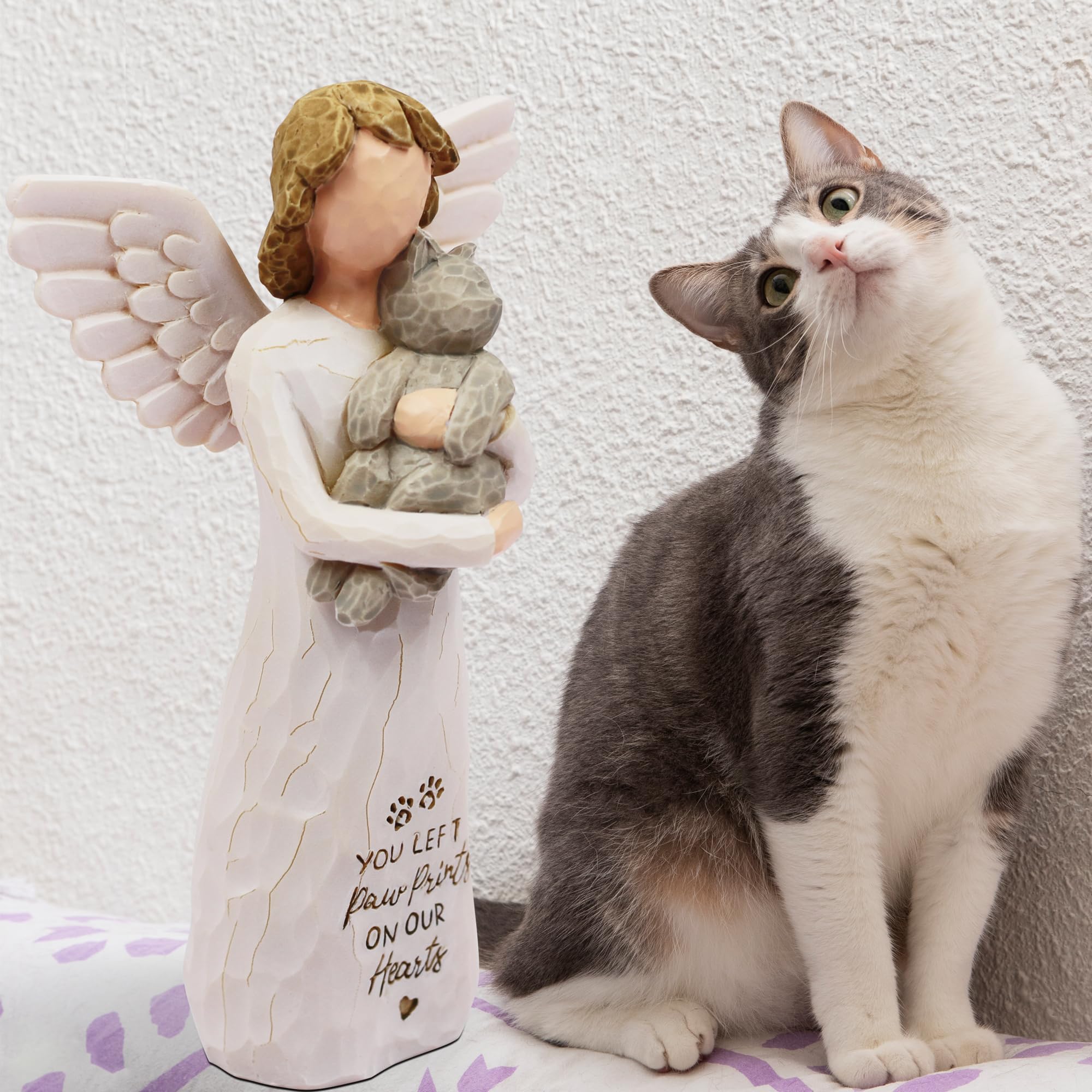 BORLESTA sculpture chat dans les bras, symbole de tendresse durable.