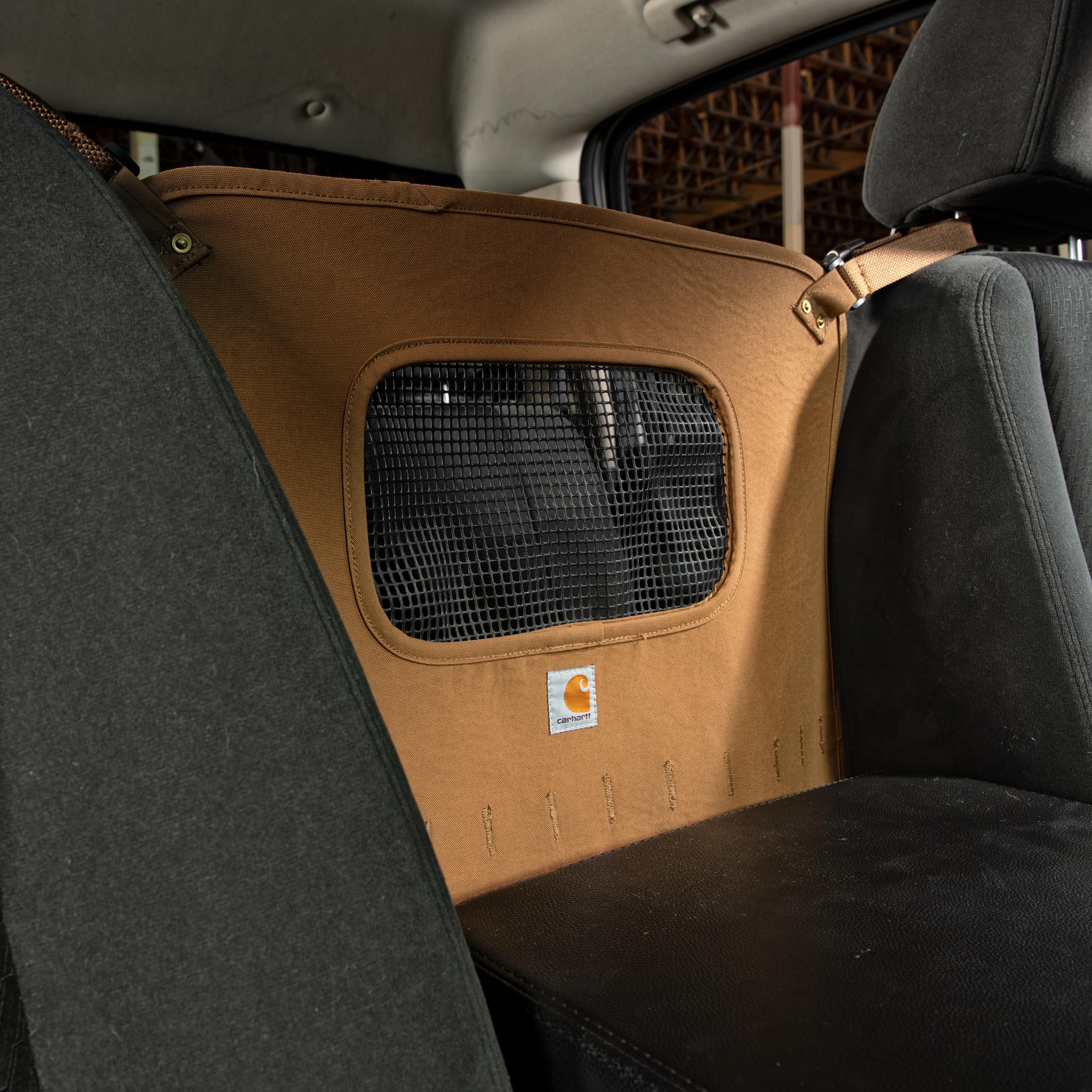 Barriere Carhartt dimensions 20-47 pouces sur 28-35 pouces pour sieges differents.