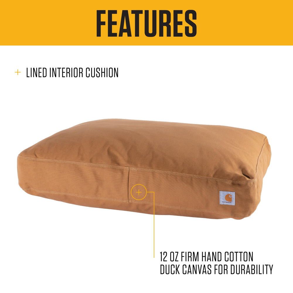 Intérieur du lit Carhartt avec sherpa doux pour chaleur et confort.