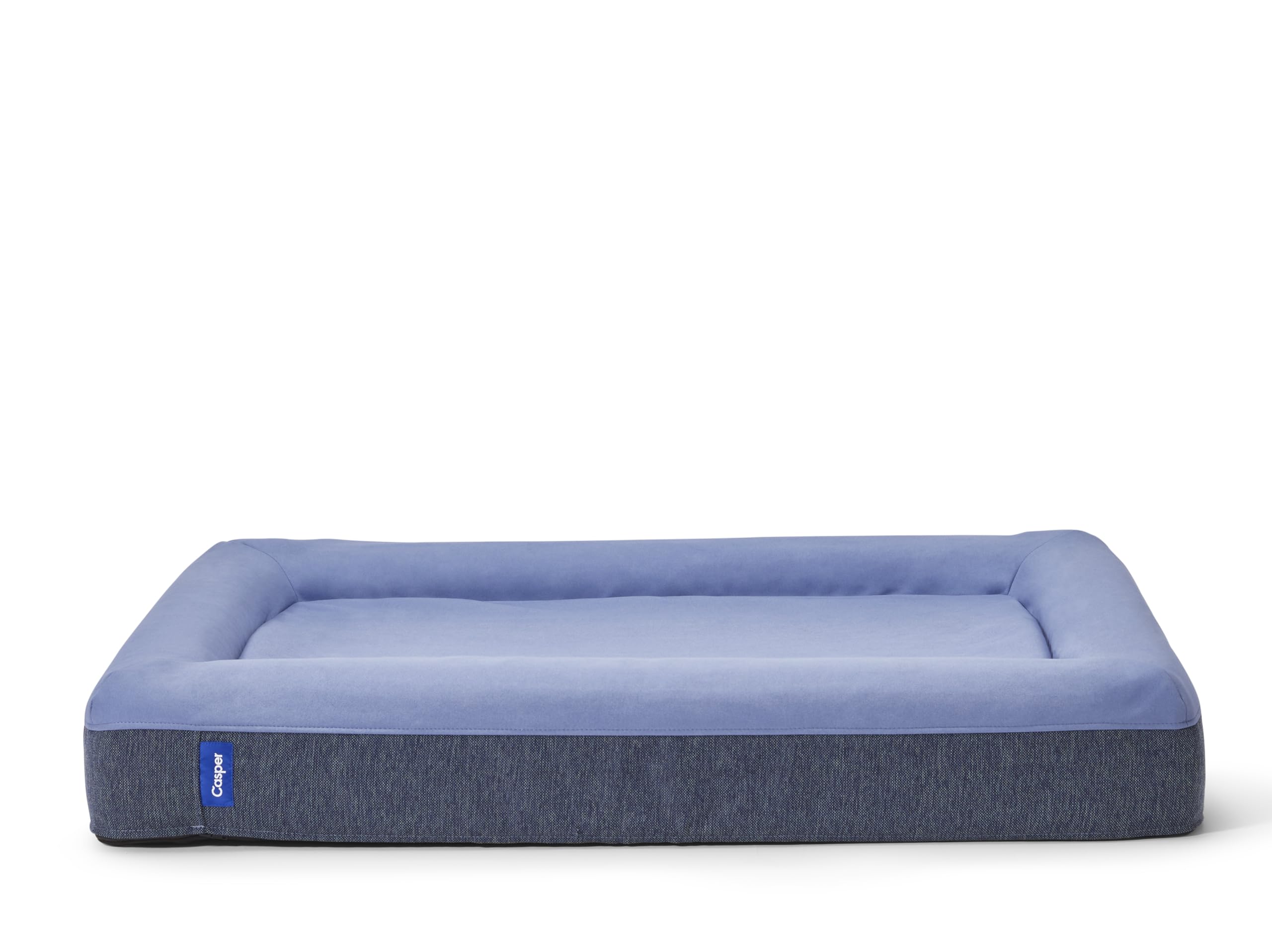 Casper lit chien bleu avec renforts et rebords rembourrés pour plus de sécurité.