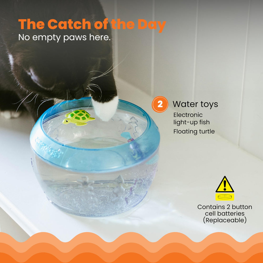 Catstages Meow-smerizing : poisson électronique nageant illuminant l’espace de jeu.