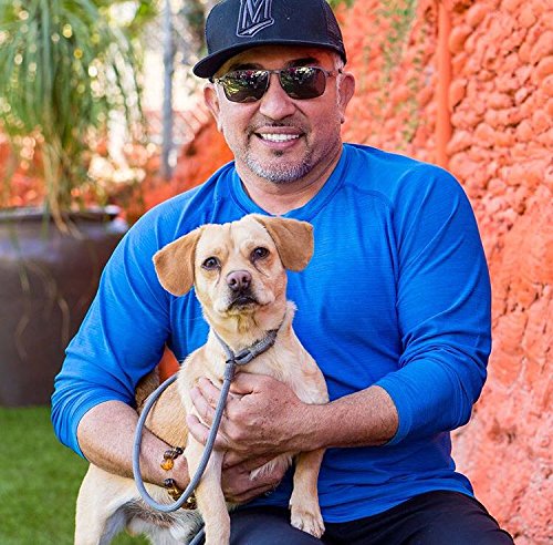 Cesar Millan Laisse Coulissante: poignée cuir tressé pour confort.
