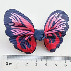 Ruban papillon chien multicolore, système clip pratique.