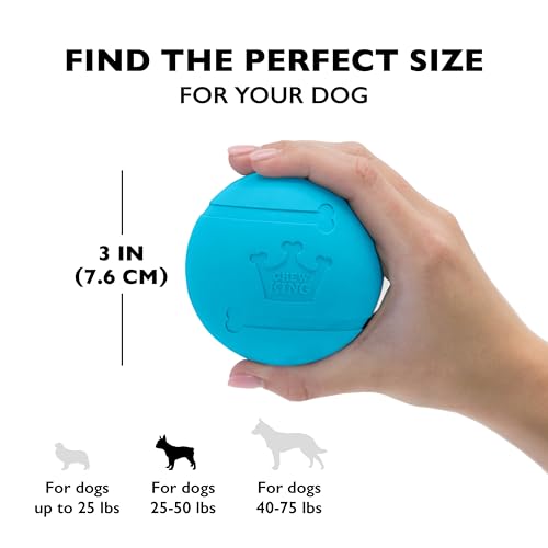 Intérieur pouvant contenir une friandise, balle Chew King Fetch favorisant le jeu interactif.