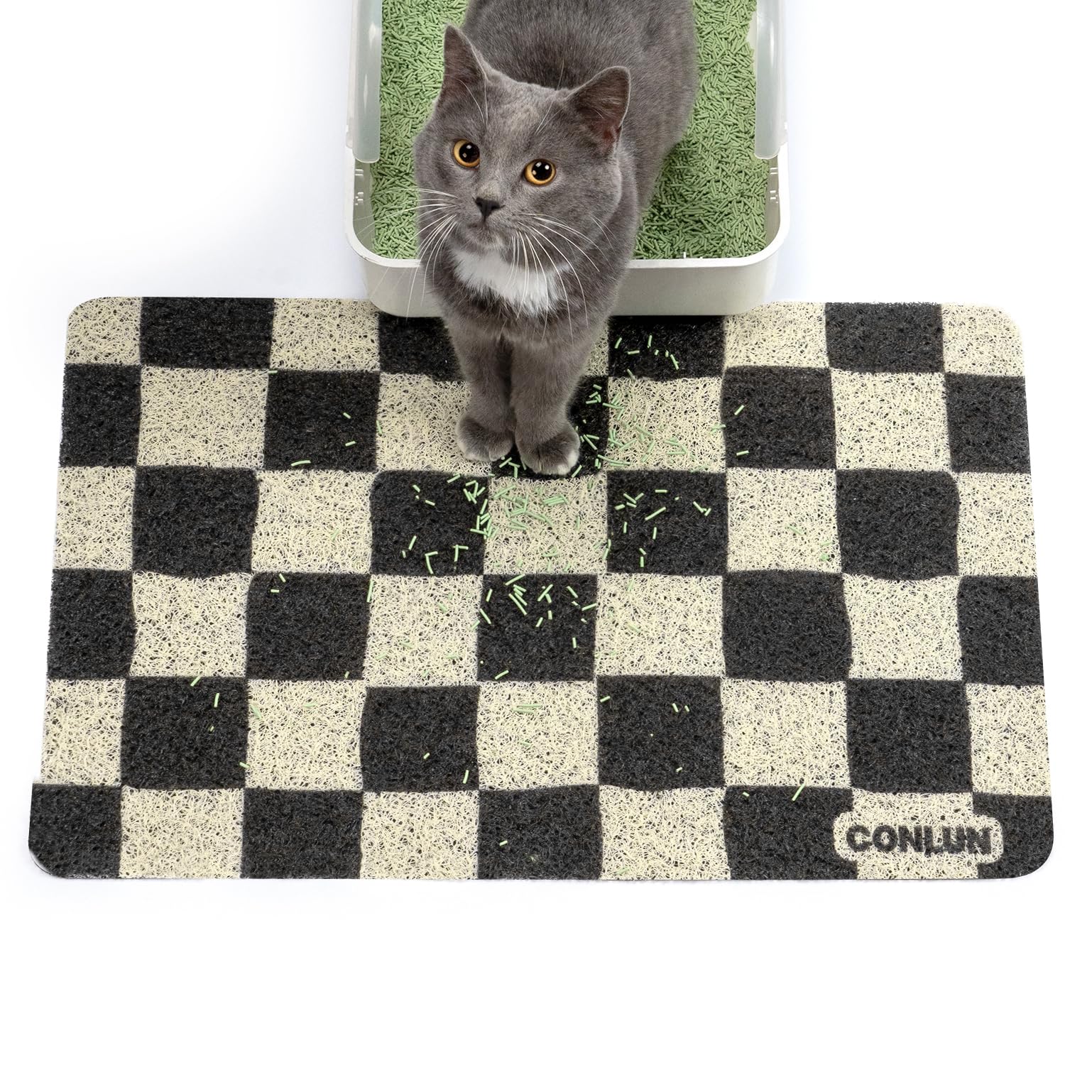 Tapis Conlun litiere damier capture les grains et protège le sol.