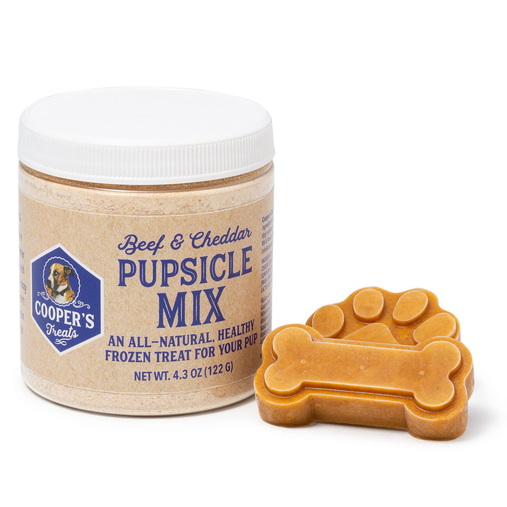 Cooper's Treats Pupsicle Mix dans sa boîte, prêt à préparer des friandises glacées pour chiens.