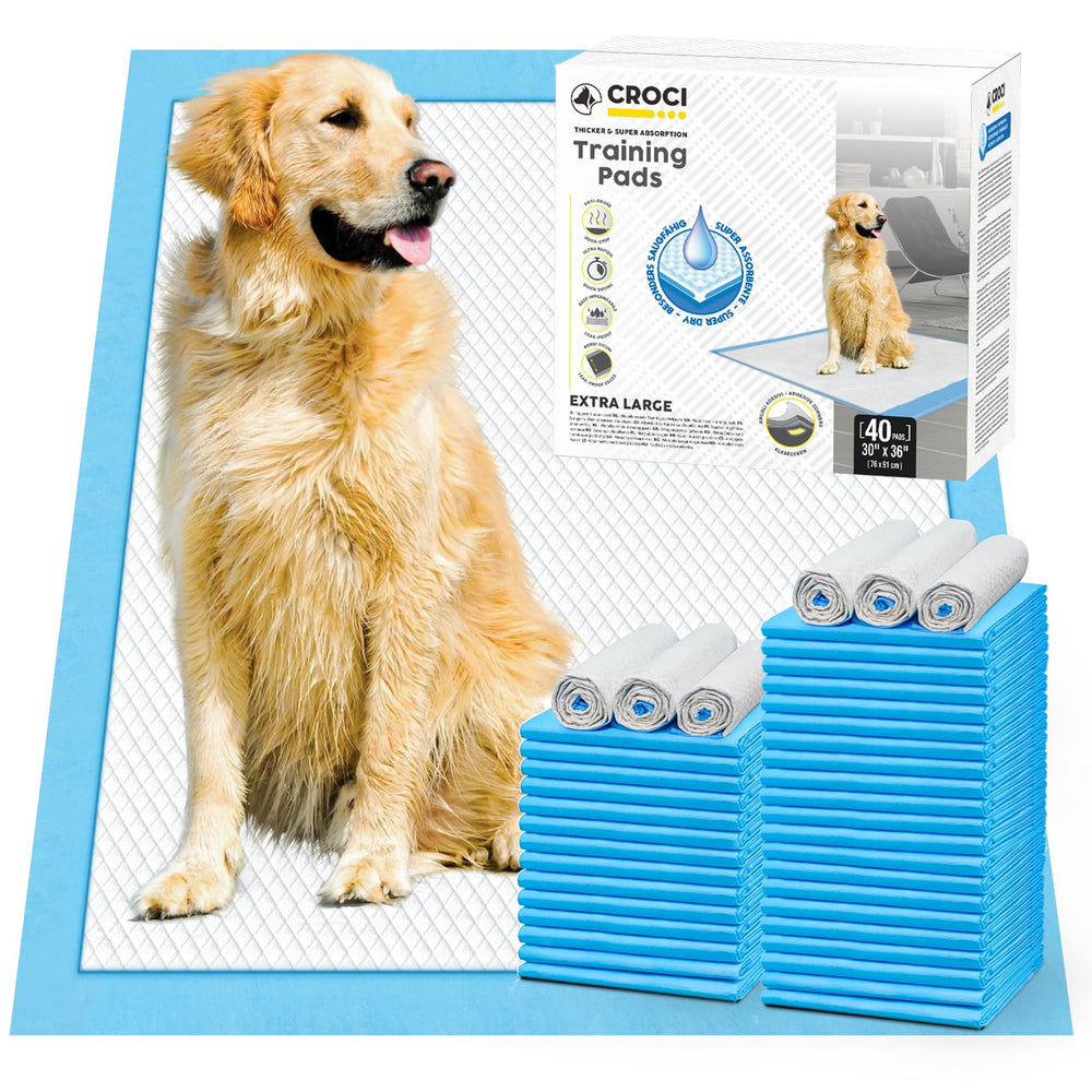 Croci Wee Wee Pads avec onglets adhésifs pour fixer solidement le tapis et protéger les surfaces.