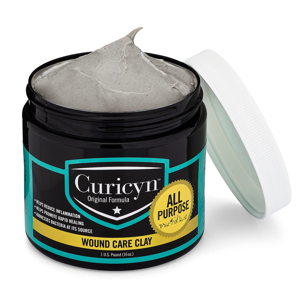 Curicyn-application-plaie-chien: application sur plaie de chien avec douceur.