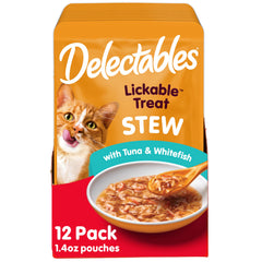 Delectables ragoût thon et poisson blanc dans bol, appétit sûr pour votre chat.