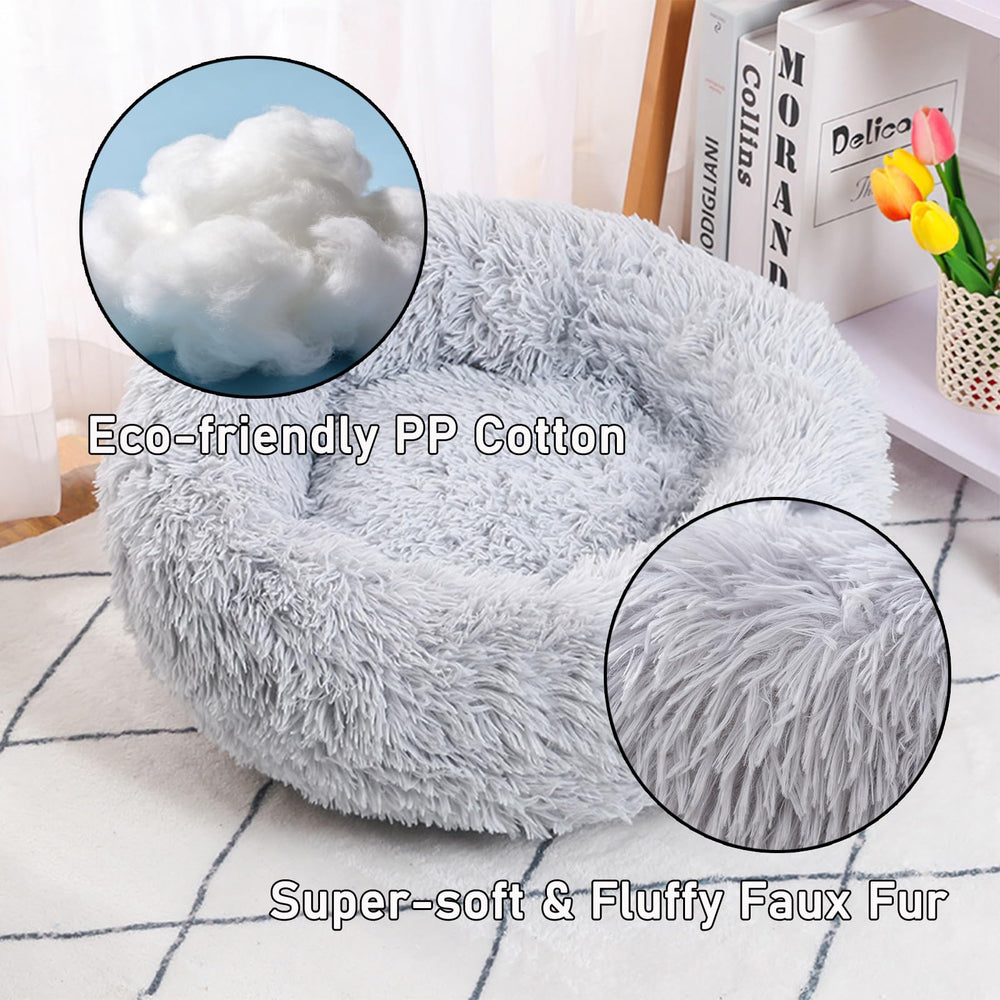 Lit rond douceur peluche Doimier gris clair, surface chaude et cocooning.
