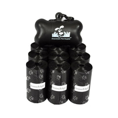 Distributeur Downtown Pet Supply avec sacs-poubelle pour chien lors d’une promenade.