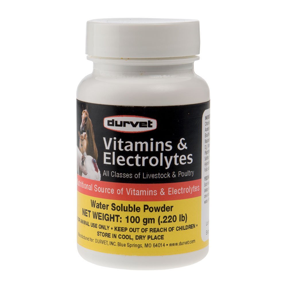 Durvet vitamines et électrolytes pour le bétail, emballage et doseur, soutien nutritionnel potentiel.
