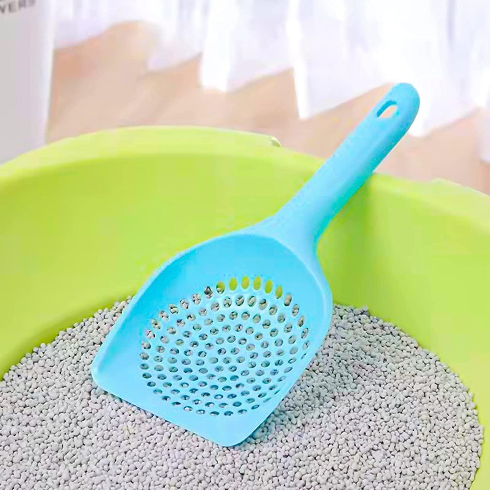 Conception ergonomique de la louche Eruinfang pour éviter le contact avec la litière.