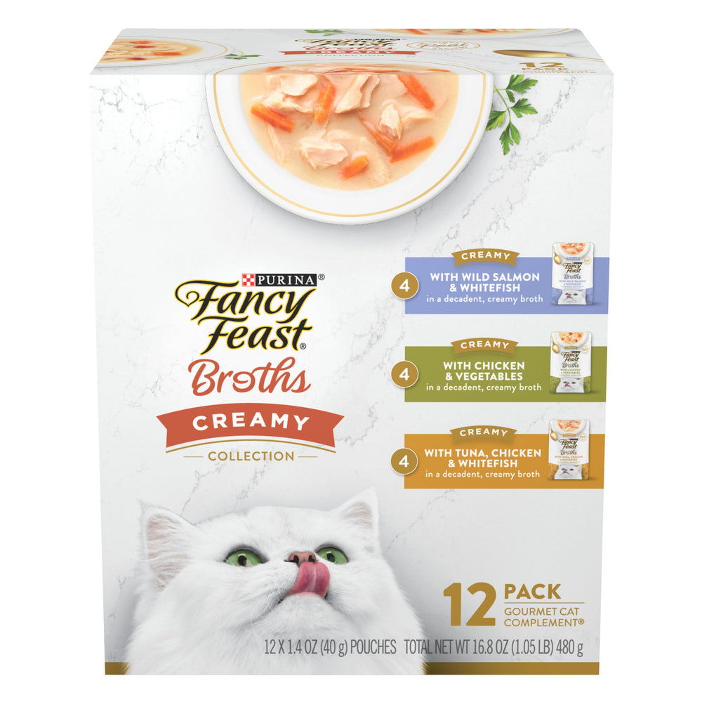 Fancy Feast Bouillons crèmeux poulet et légumes en sachet, idéal pour rehausser le repas du chat.
