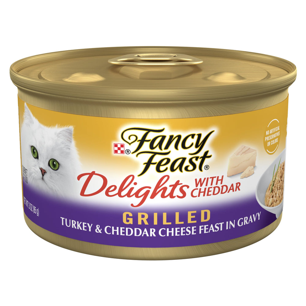Fancy Feast Delights dinde grille cheddar avec jus, idéal pour stimuler l'appétit félin.