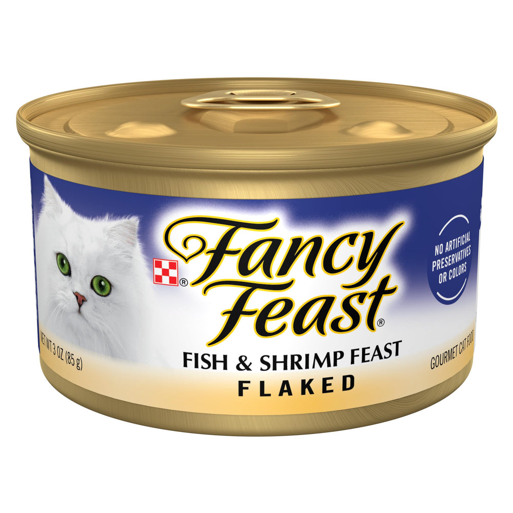Fancy Feast poisson et crevettes floconnees dans boite, texture gourmande prête à servir.