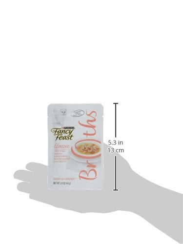 Saumon sauvage et légumes dans un bouillon soyeux pour Fancy Feast.