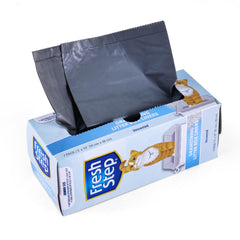Sac Fresh Step jumbo installé dans un bac à litière extra large, prête pour un changement propre.