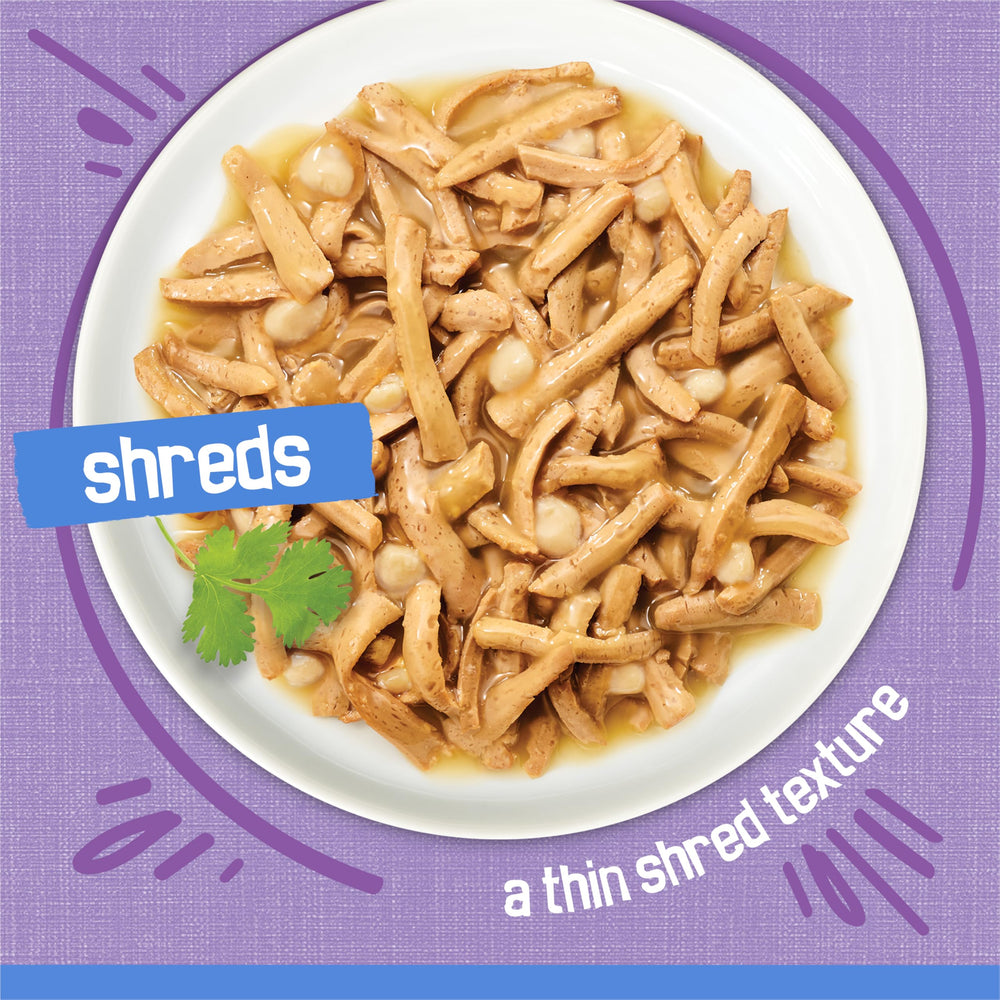 Friskies Shreds Dinde Fromage en Gravy, texture en lamelles et sauce riche.