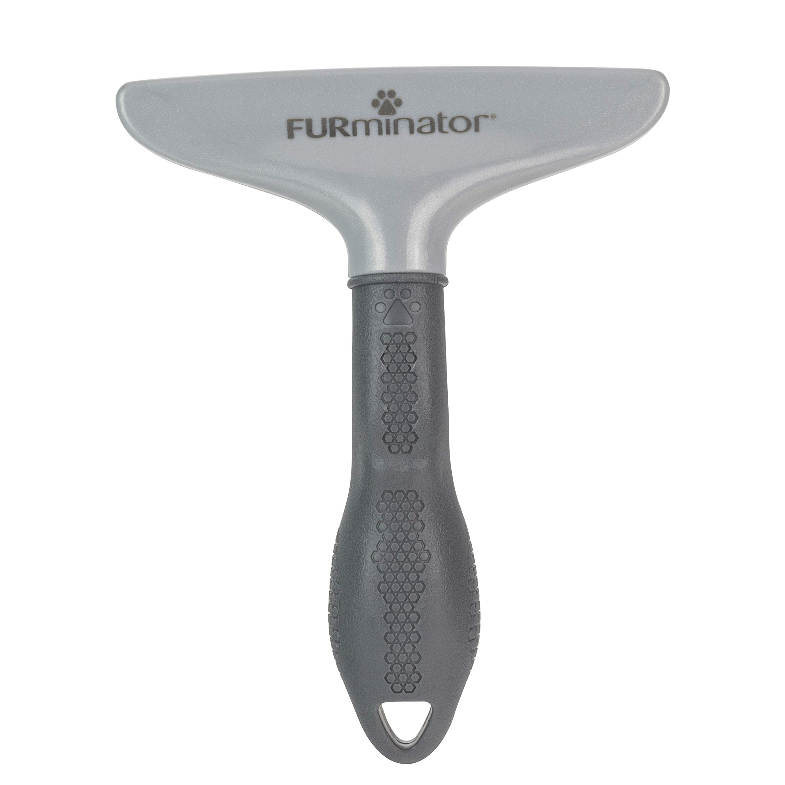 FURminator Grooming Rake: prise en main ergonomique et antidérapante.