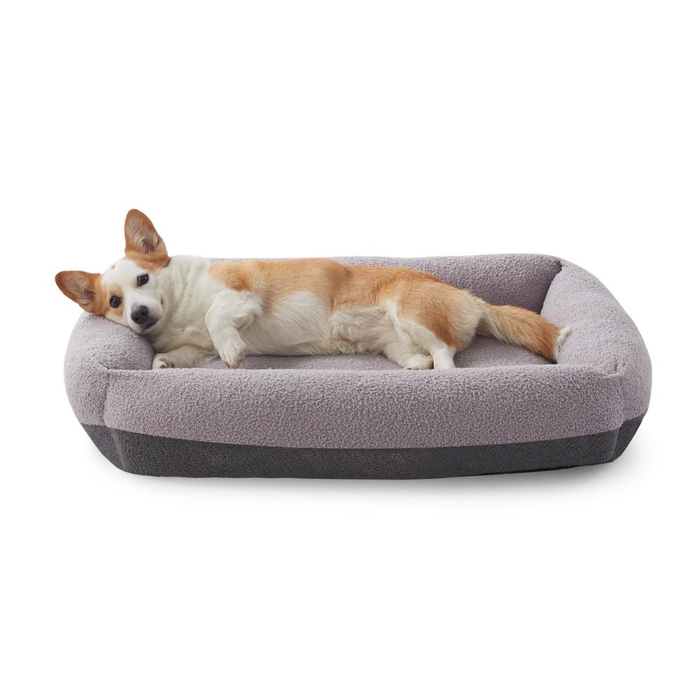 Lit FurTime pour chien moyen avec peluche douce offrant un cocon réconfortant.