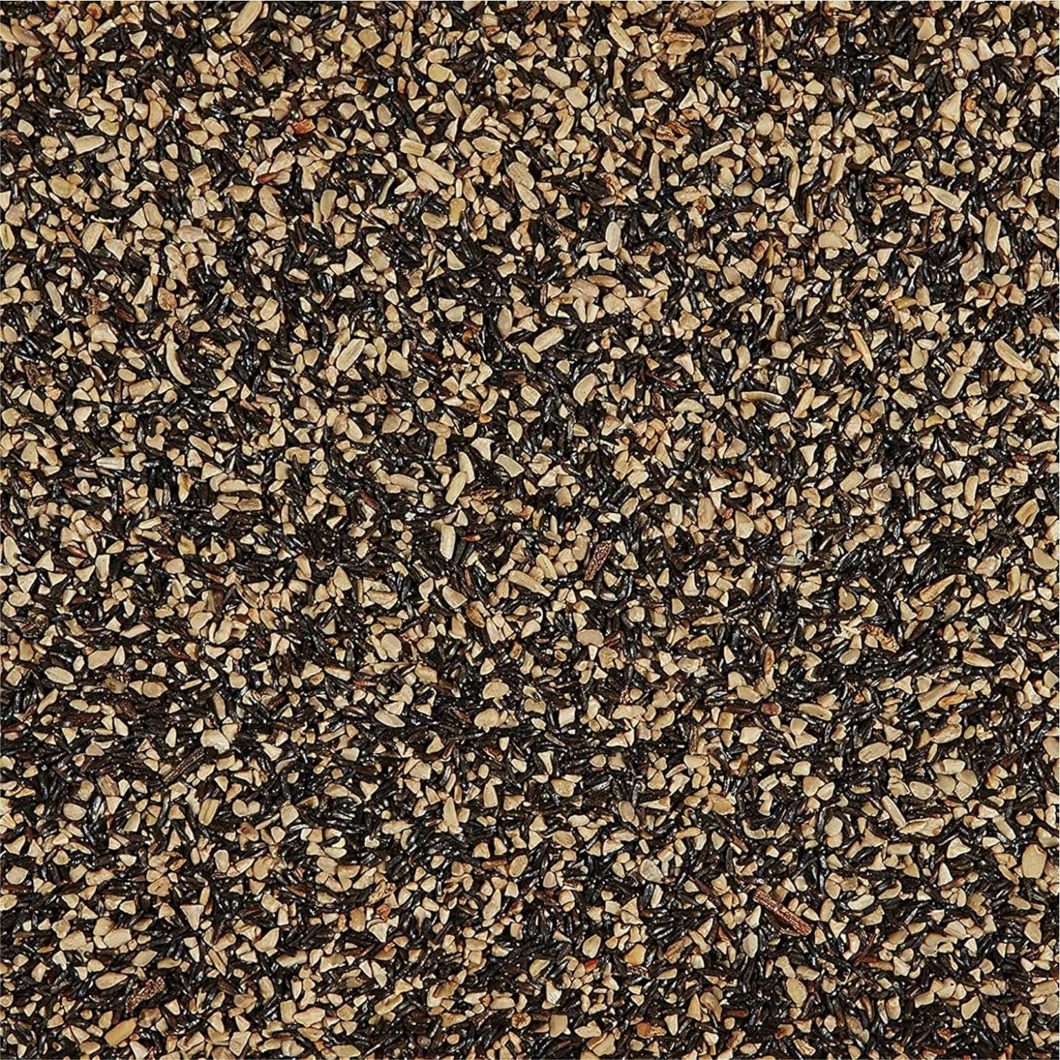 Happy Wings Finch Blend sac ouvert montrant le contenu coloré et riche en graines.