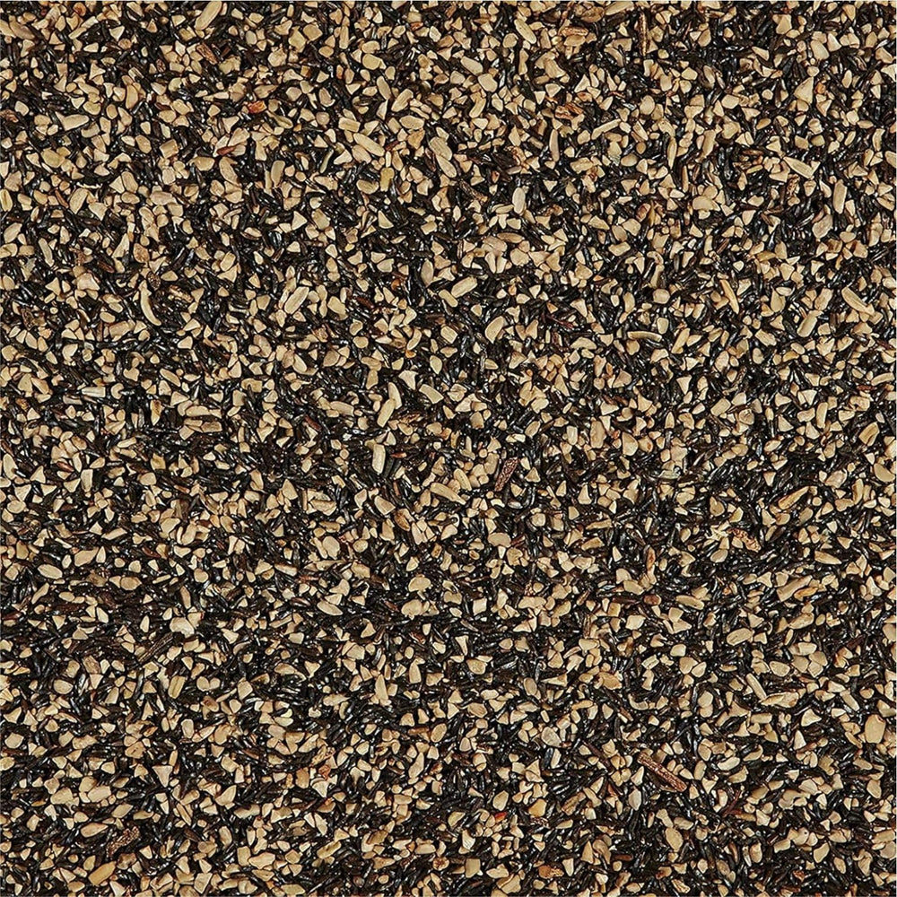 Happy Wings Finch Blend sac ouvert montrant le contenu coloré et riche en graines.