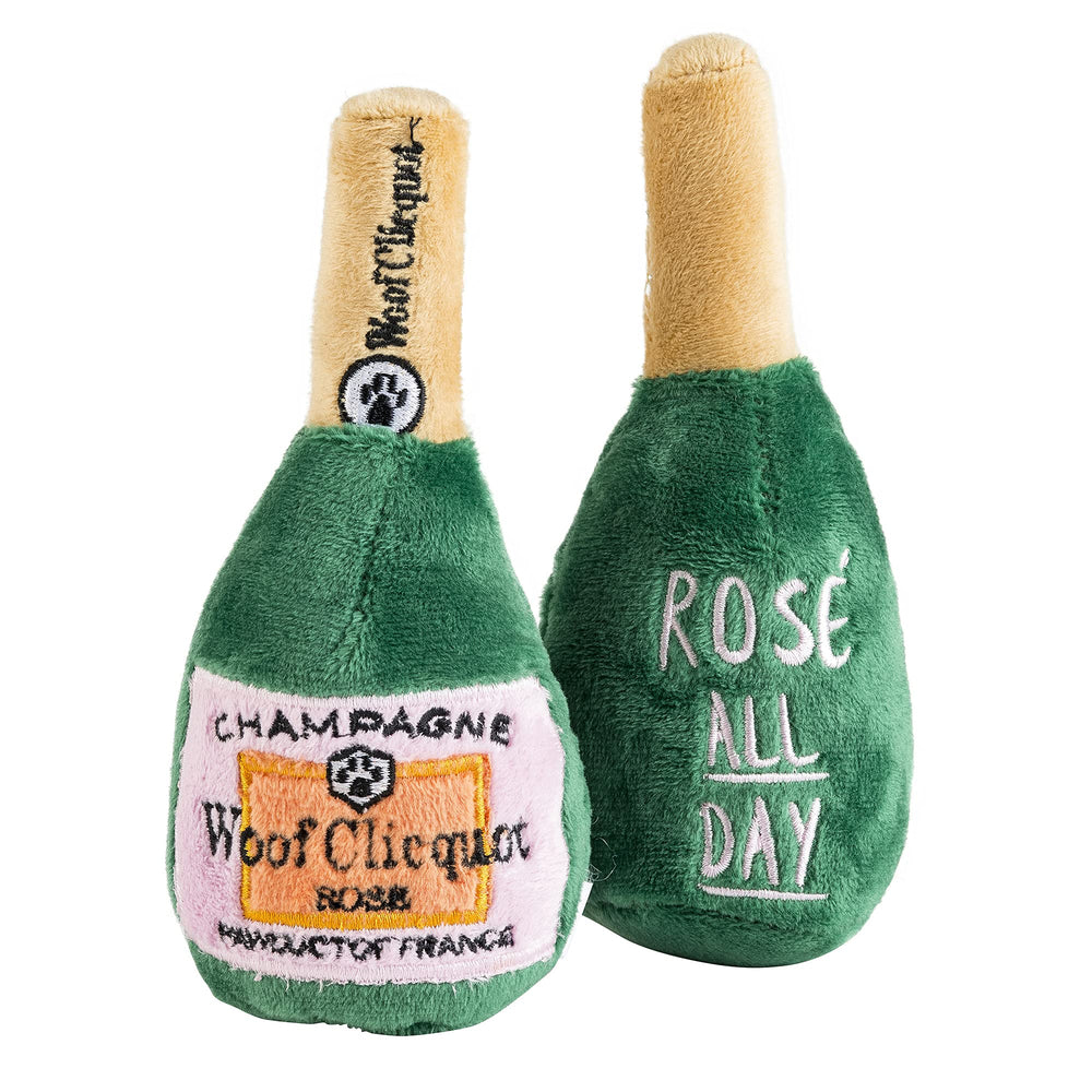 Woof Clicquot Rose avec sifflet interne pour jeux interactifs.