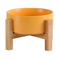 Bol chat elevé en céramique et bambou jaune, pratique pour les repas.