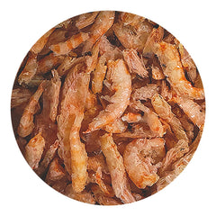 Grains fins de krill lyophilisé, texture légère et croquante.