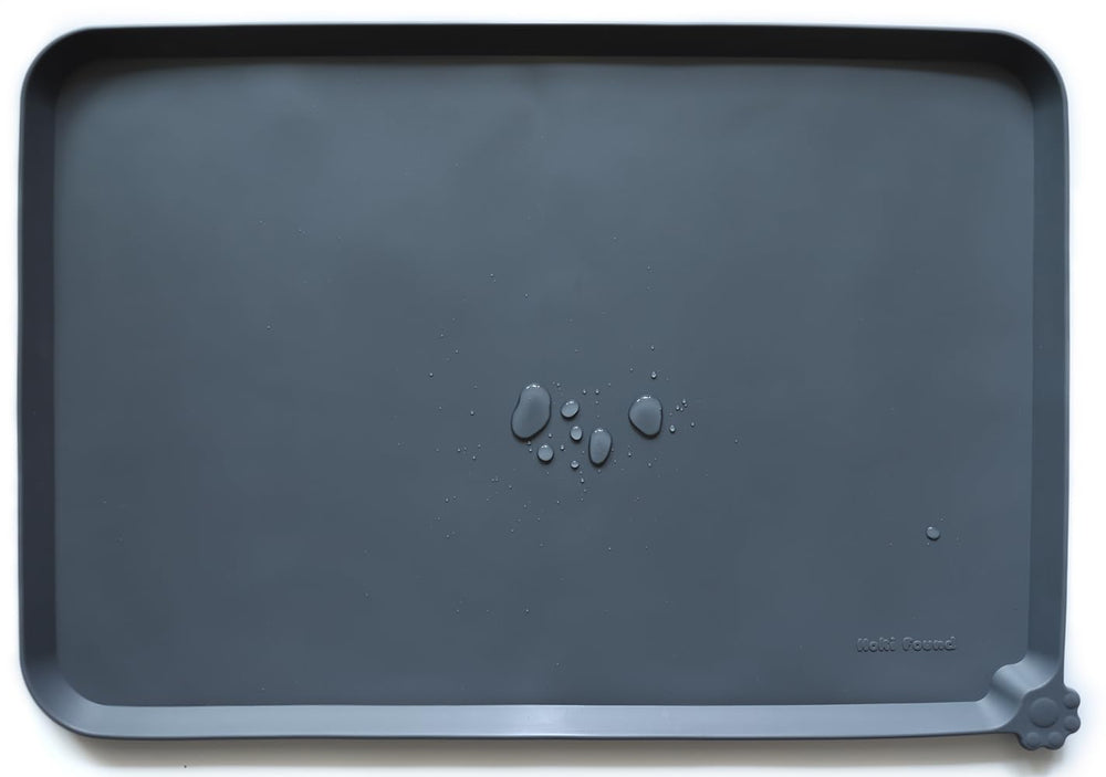 Tapis d'alimentation Hoki Found en silicone anti-glisse protégeant sols.